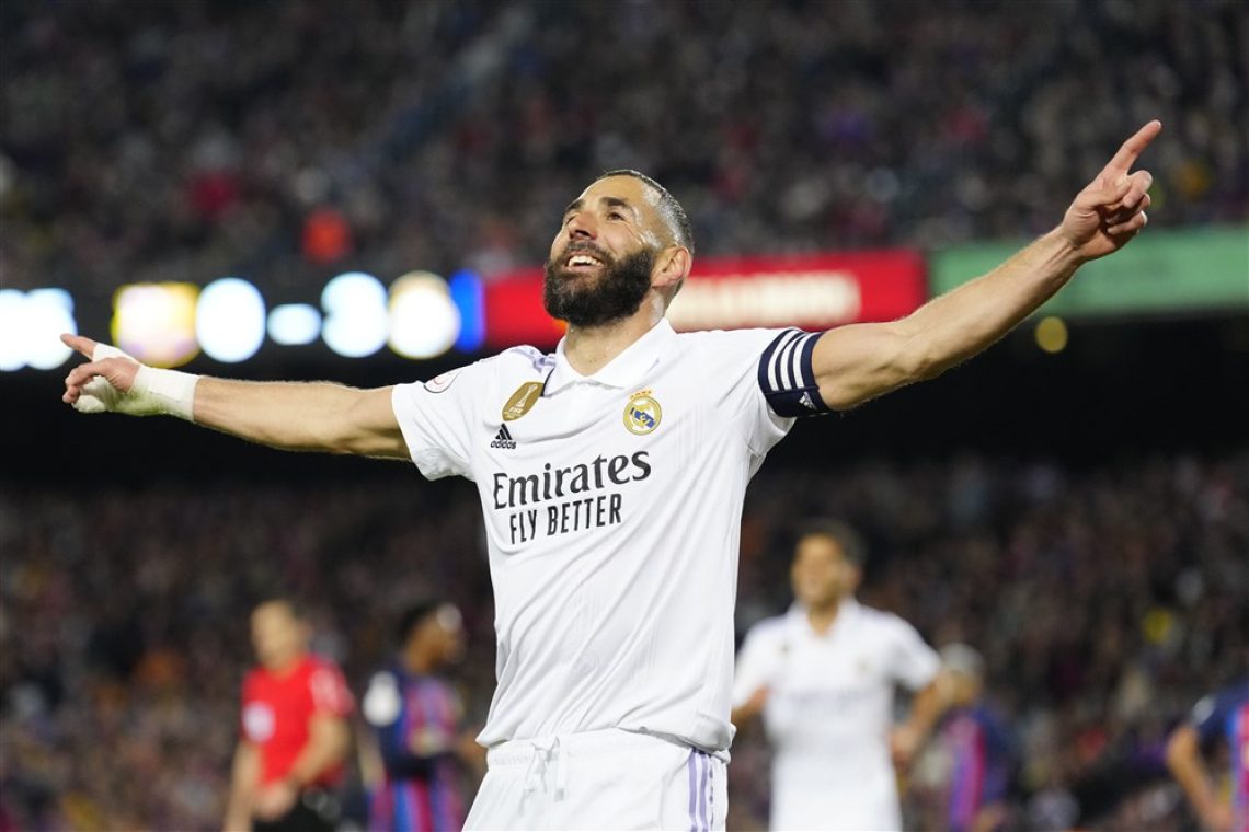 Real z Benzemajevim hat-trickom izločil Barcelono